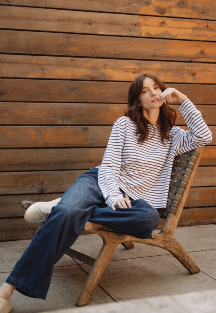 Denim pants with drawstring waist and wide-leg silhouette, styled casually