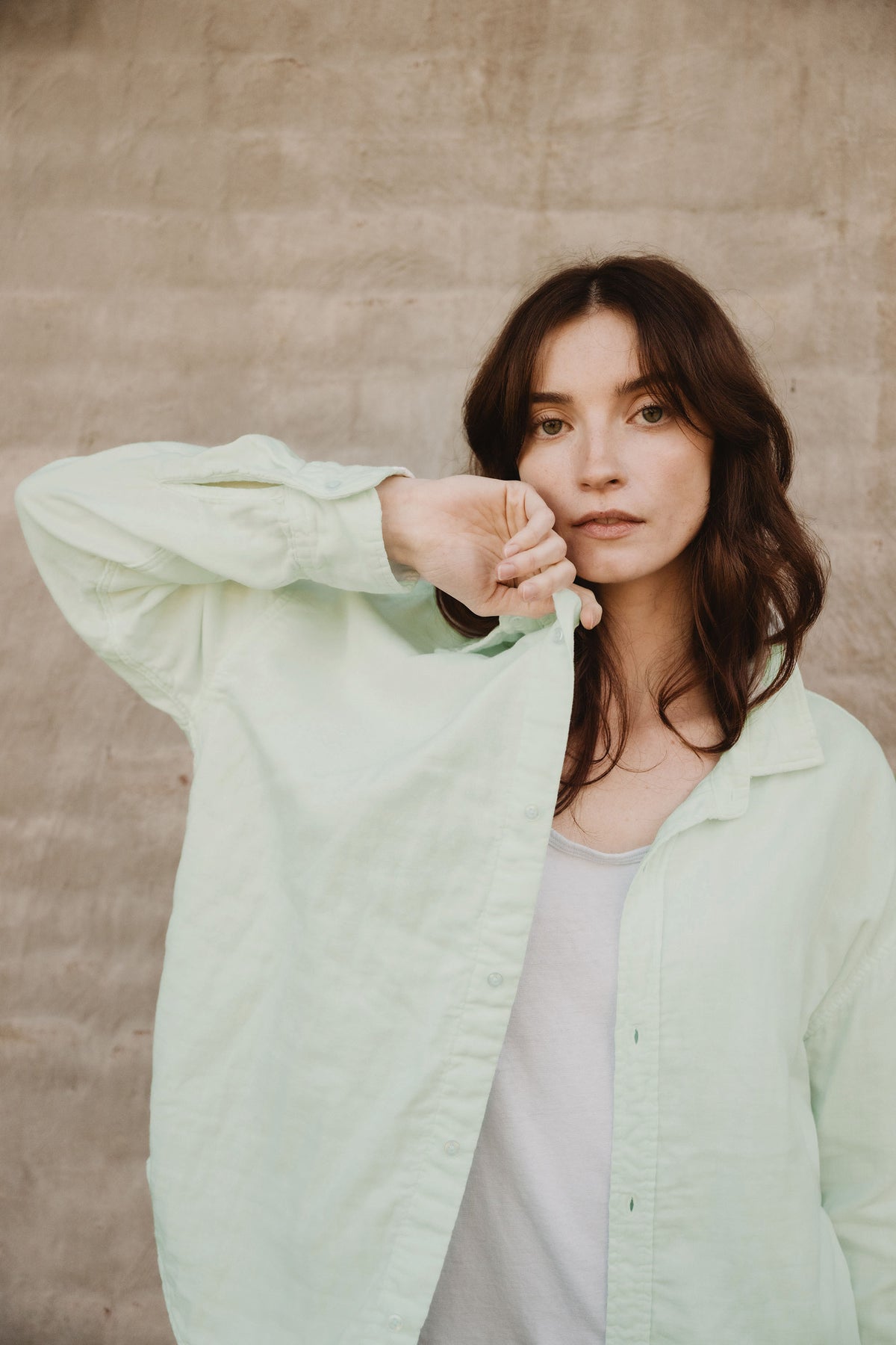 Light mint triple gauze easy shirt with pointed collar and button front, long sleeves.