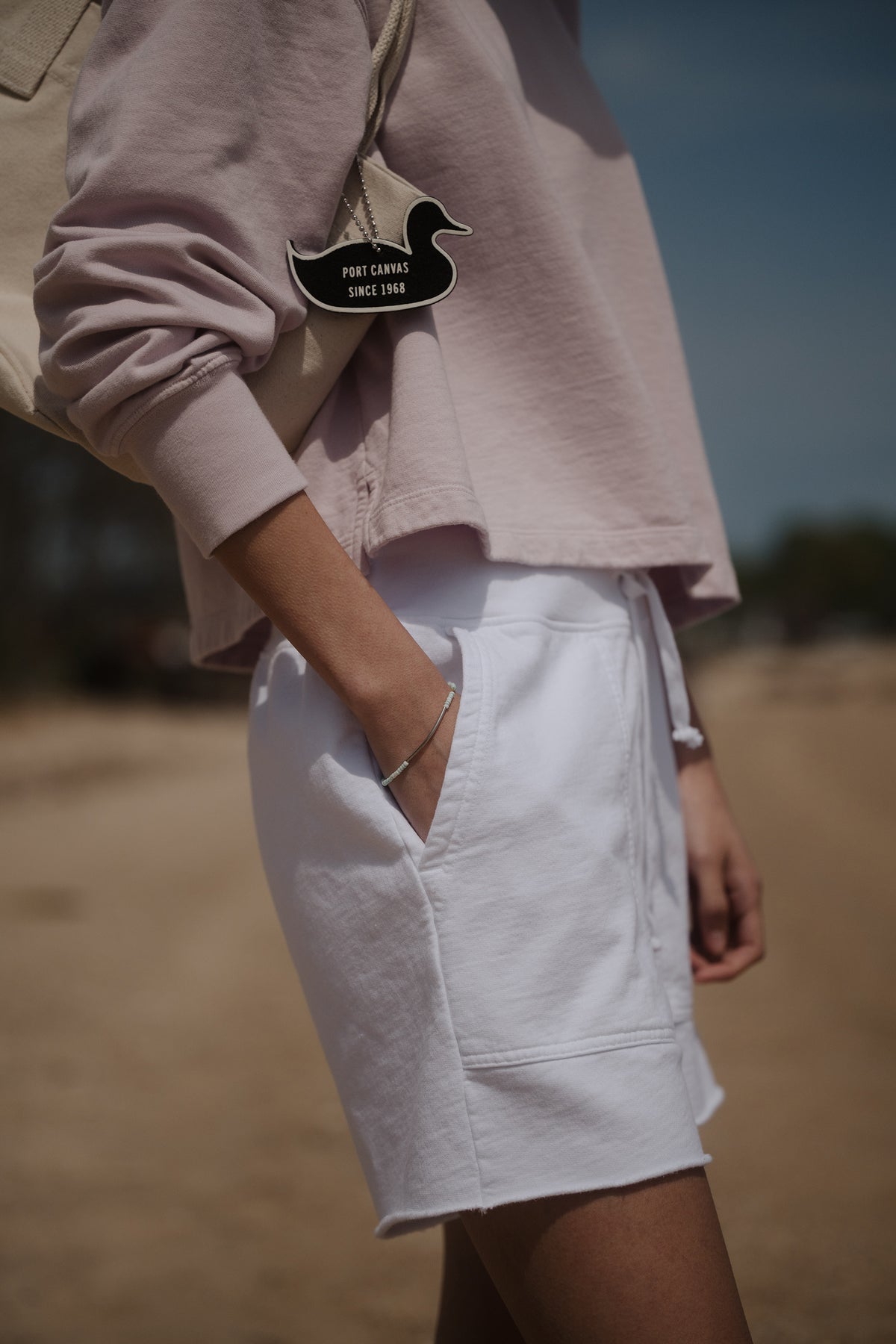 Light fleece utility shorts with drawstring waist and side patch pockets