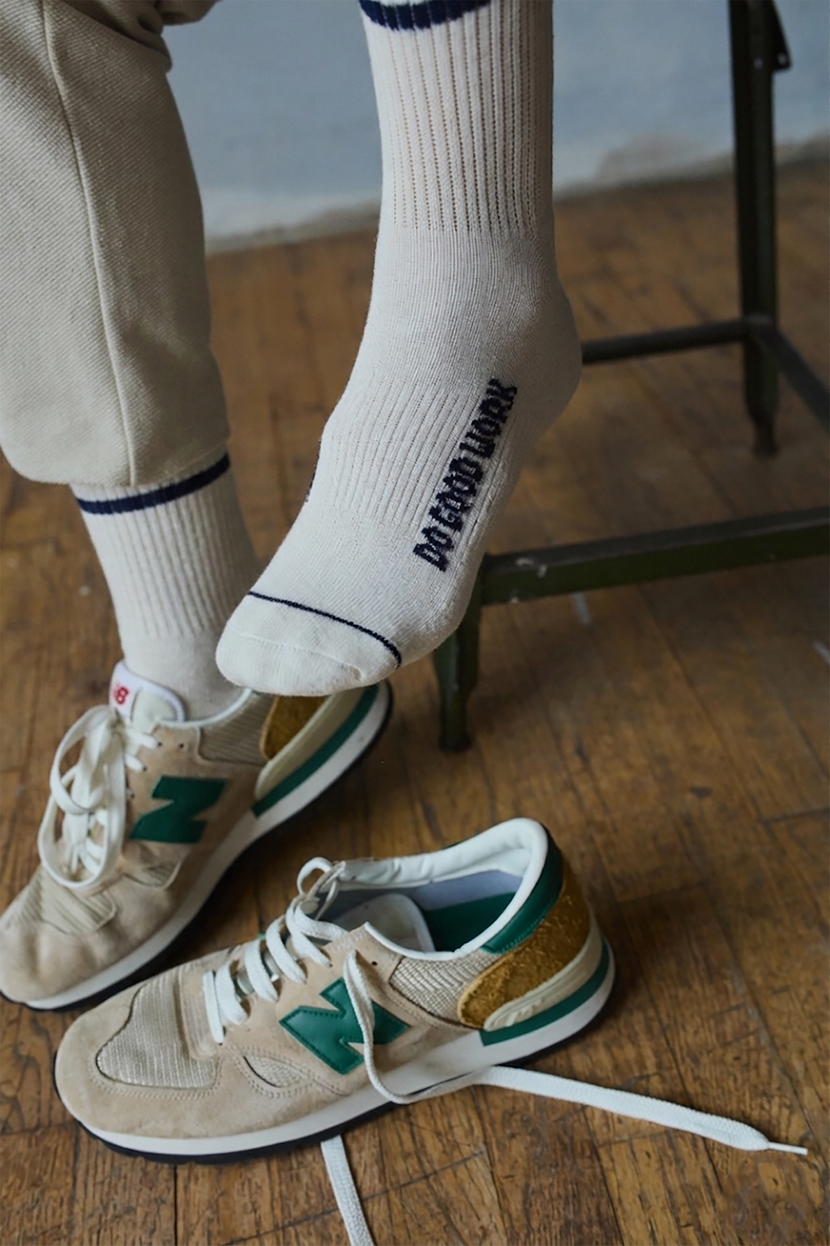 DO GOOD WORK socks in white with navy striped cuffs and printed lettering, with sneakers