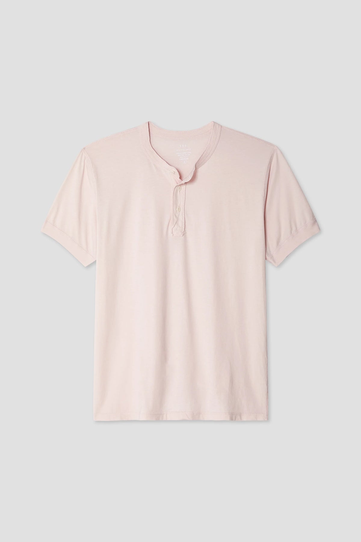 Light pink short-sleeve henley shirt with button placket and V-style neckline.