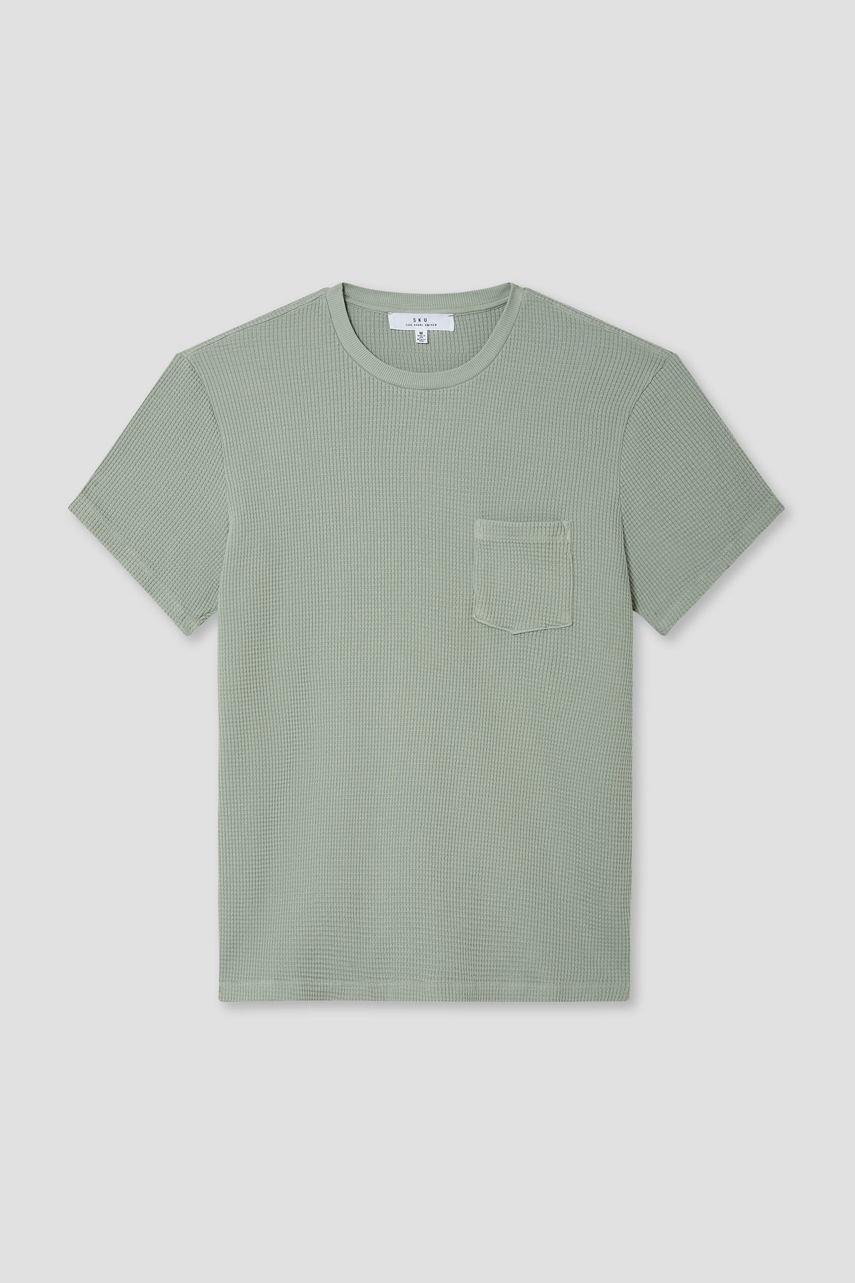 Light green waffle pocket tee with short sleeves and crew neck