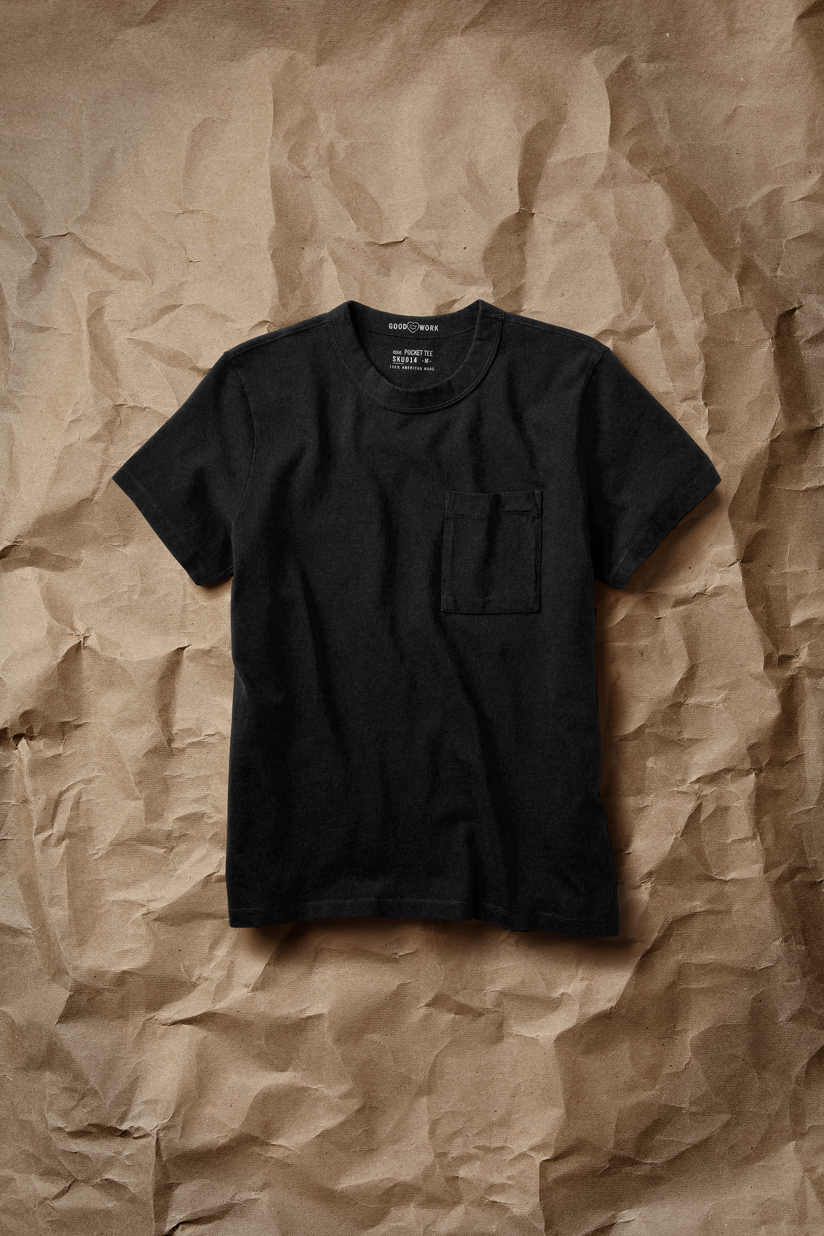 Black short-sleeve jersey pocket tee with crew neck and front chest pocket