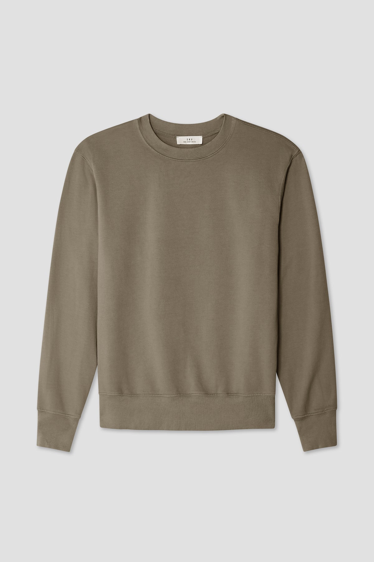 Tan crewneck sweatshirt with ribbed neckline, cuffs, and hem