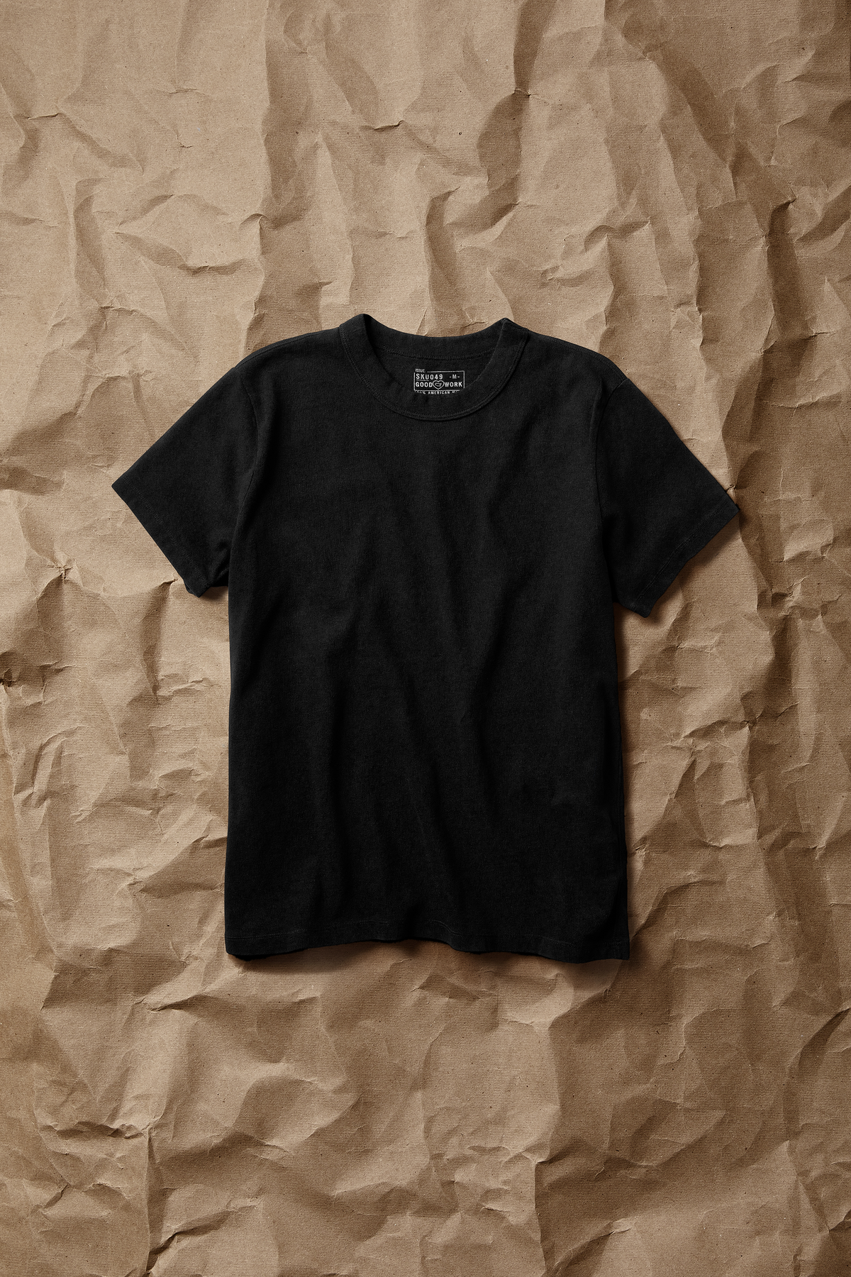 Black short-sleeve crew-neck T-shirt with ribbed crew collar and straight hem.