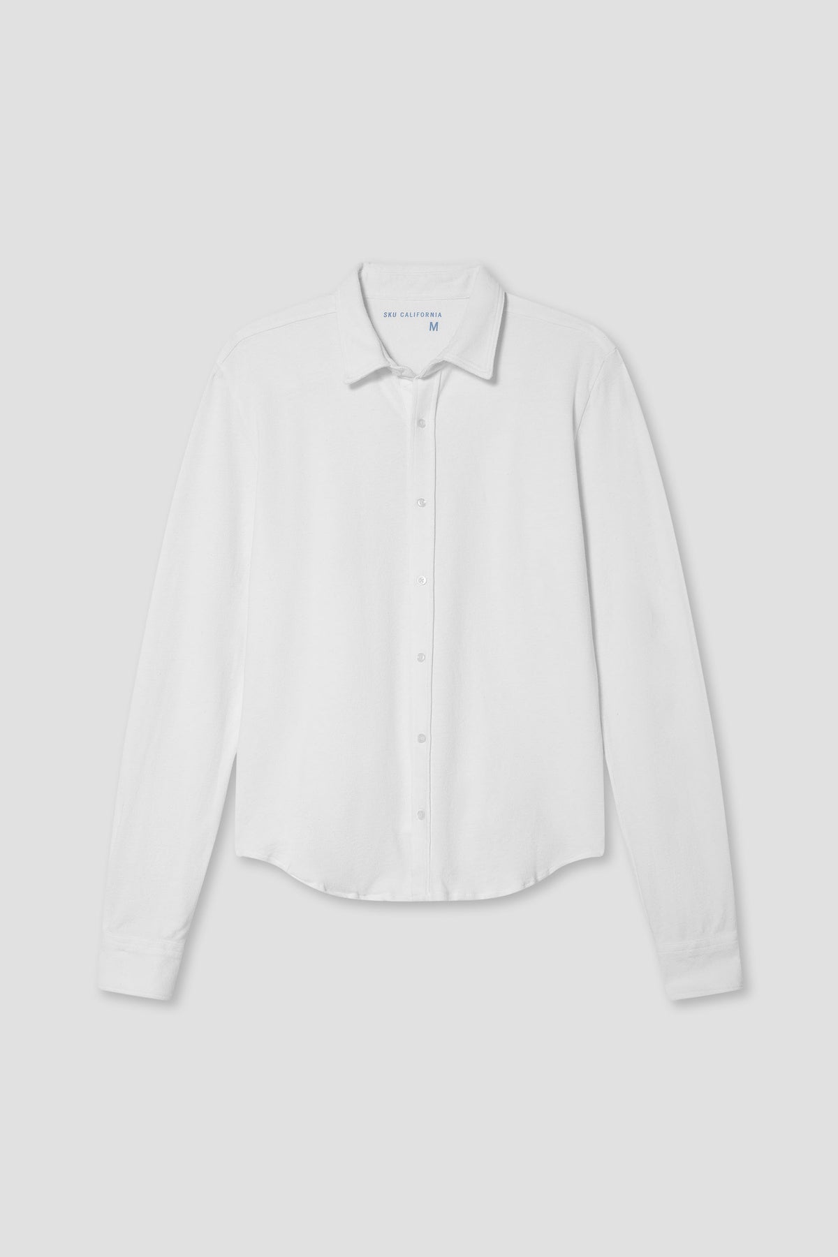 White cotton-hemp easy shirt with button-front placket, pointed collar, long sleeves