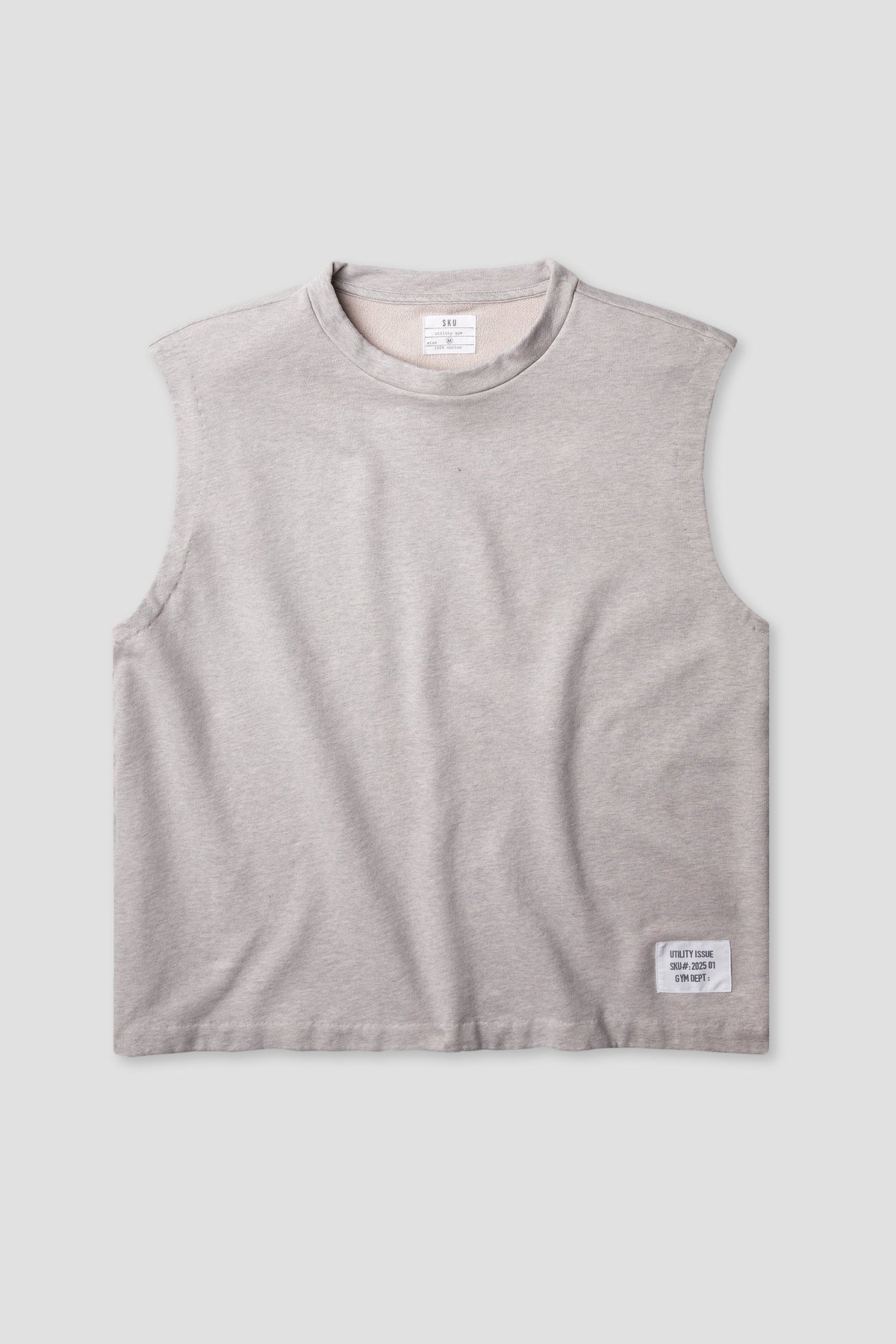 Heather grey sleeveless muscle tee, crew neck, small logo patch on hem