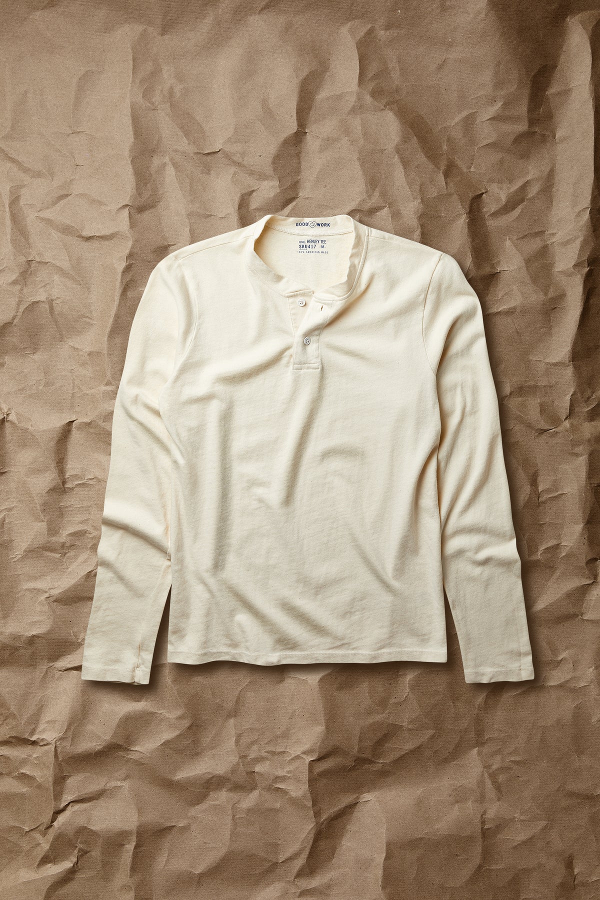 Light cream long-sleeve jersey henley shirt with button placket