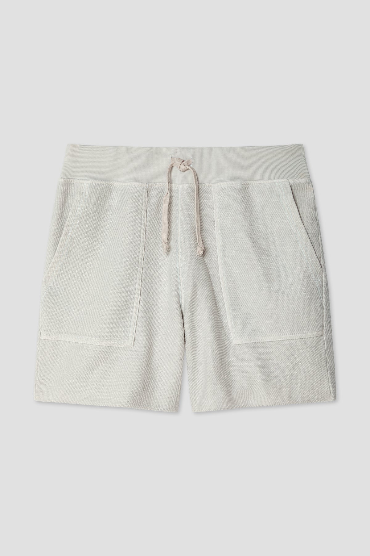White terry utility sweat shorts with drawstring waist and side patch pockets