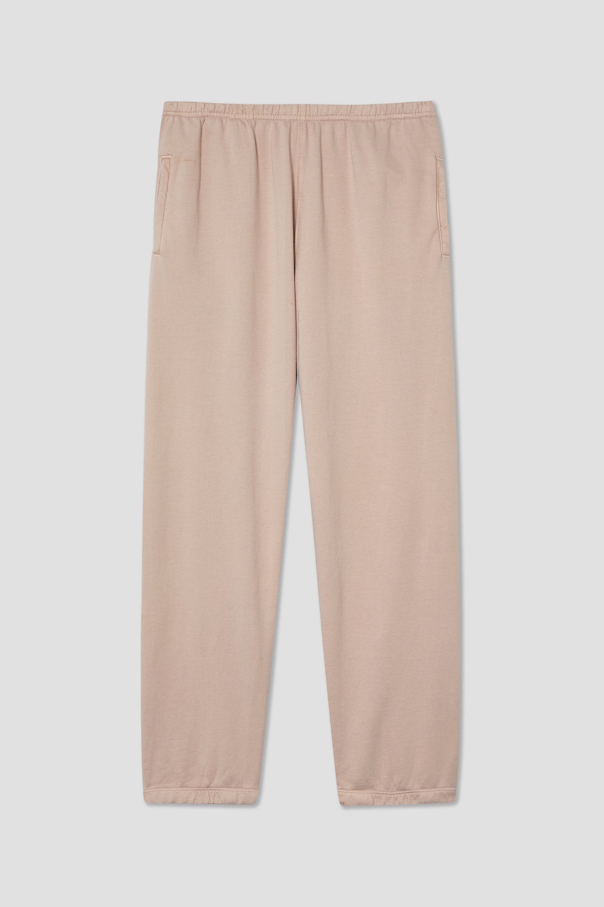 Beige fleece sweatpants with elastic waistband and cuffed hem