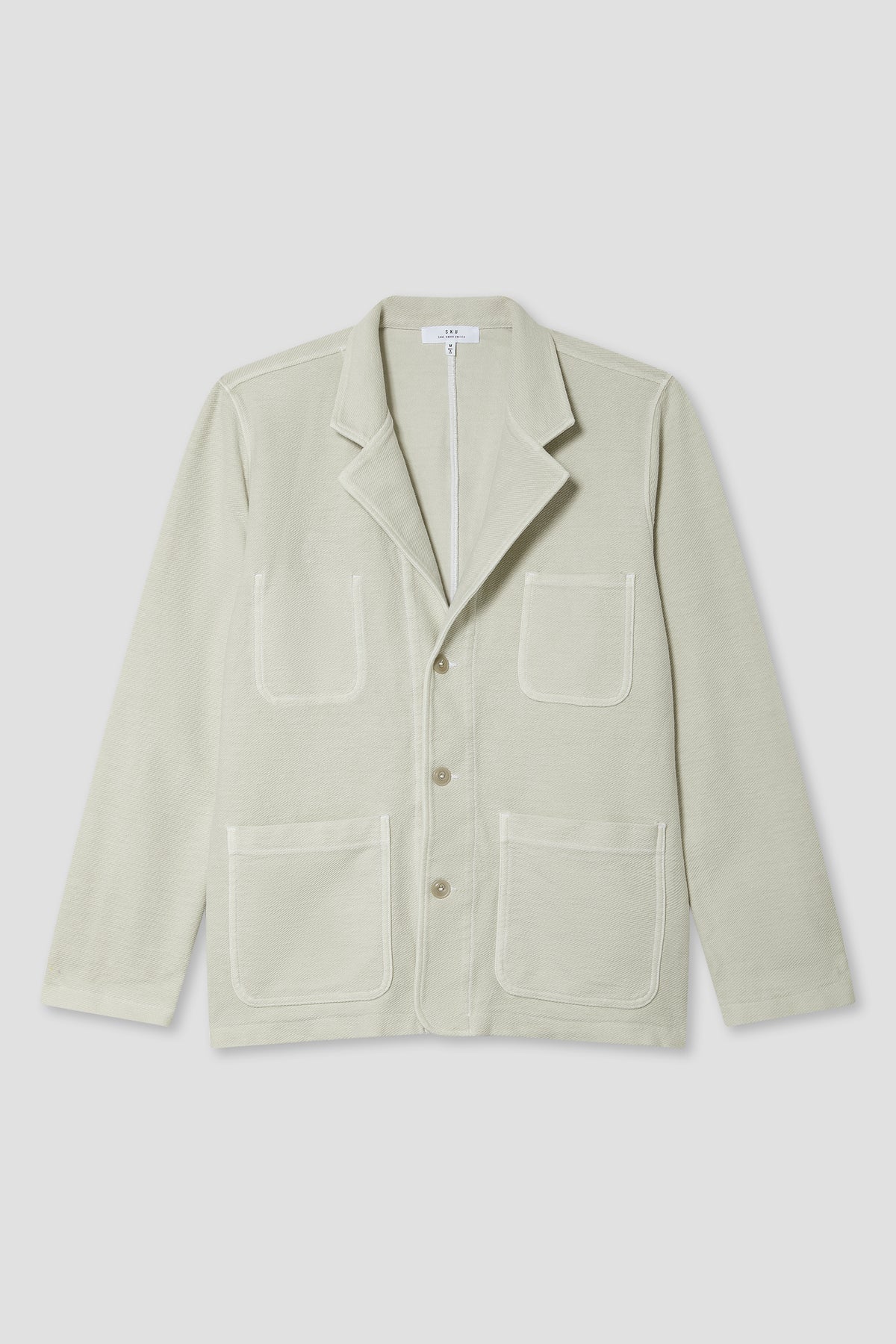 Salt twill terry blazer with notched lapels, flap patch pockets, and button front.
