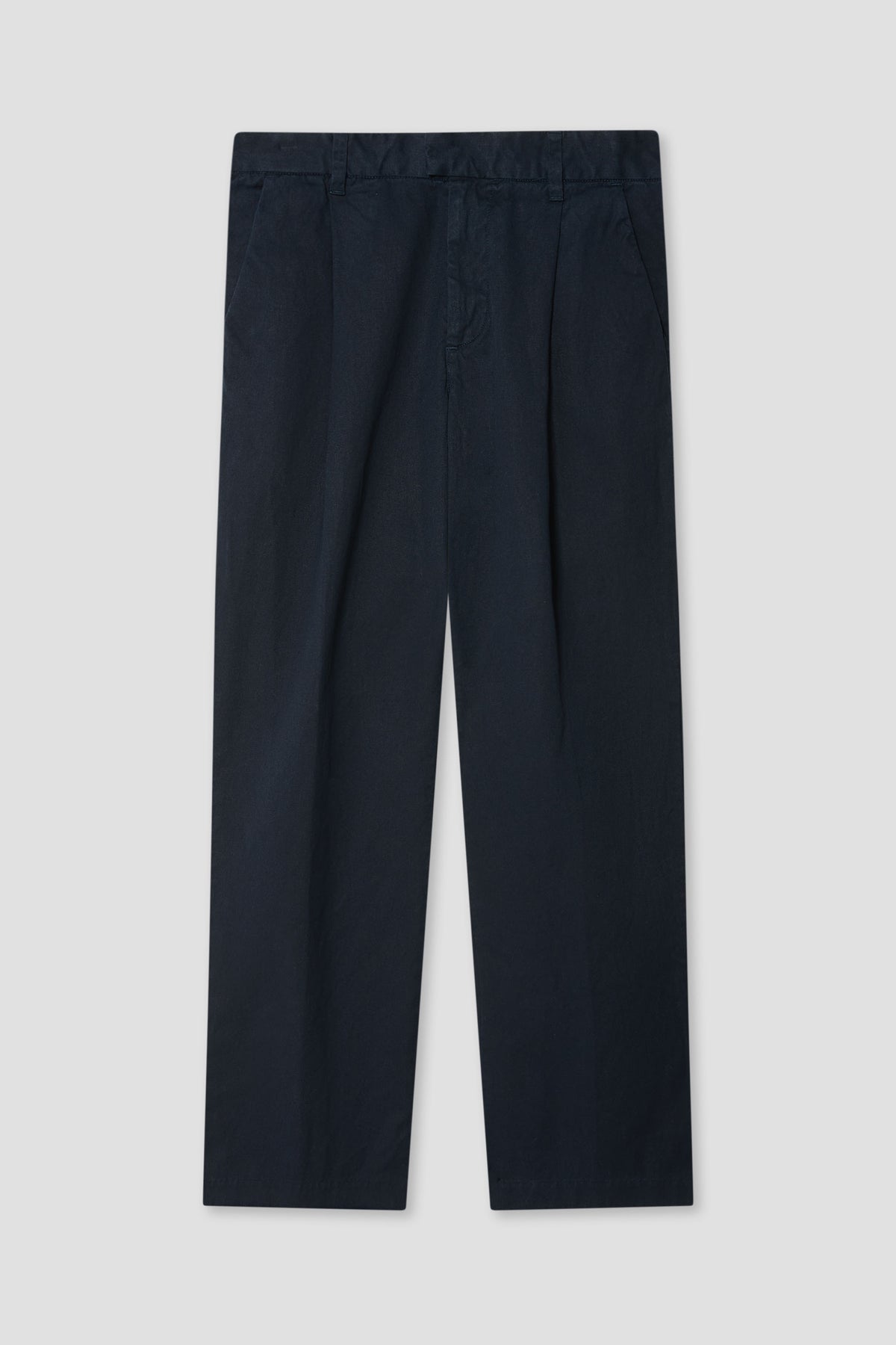 Navy blue pleated chino pants with pleated front and straight legs, button waist
