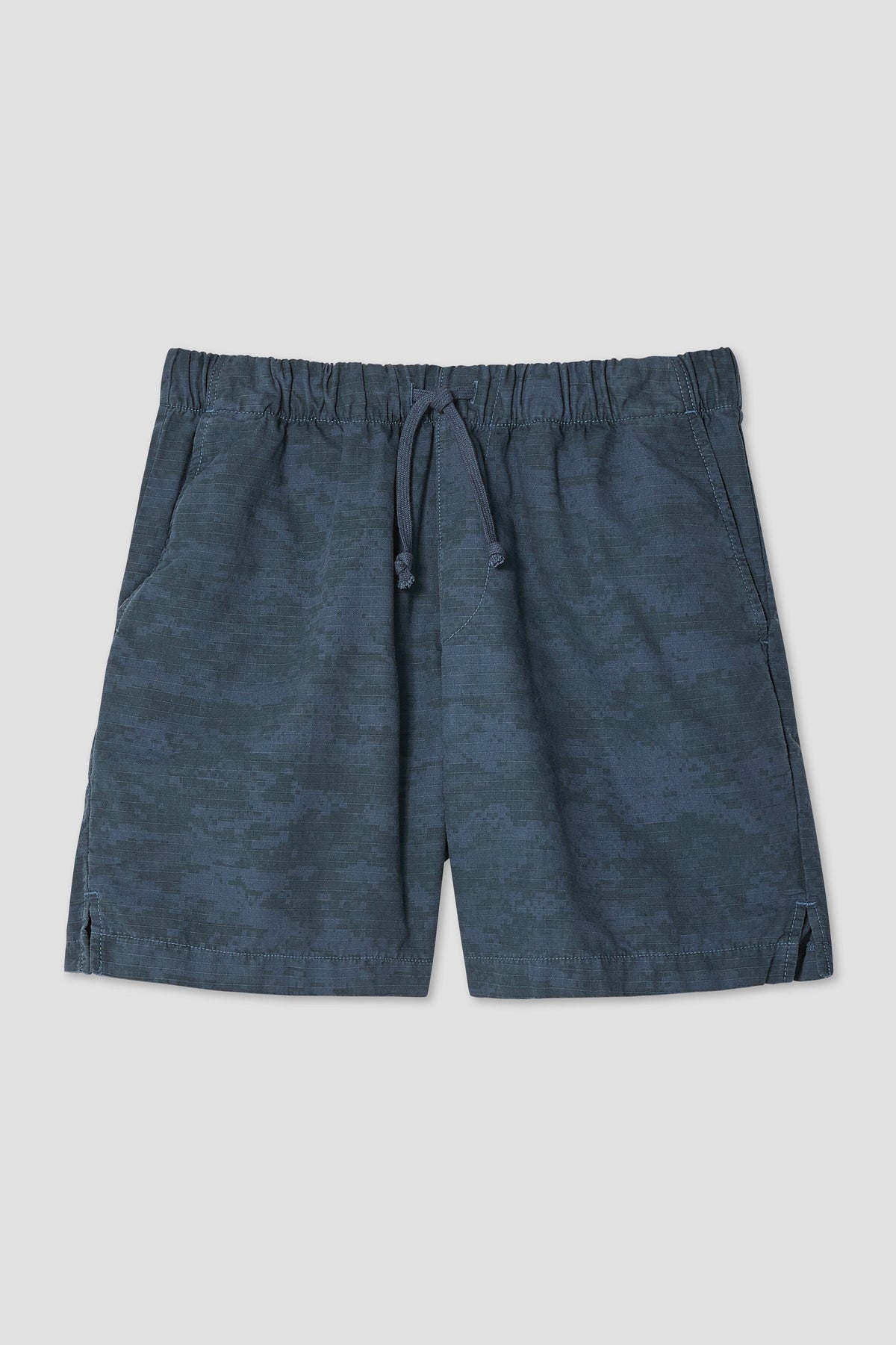 Overdyed solid shorts in blue with elastic waistband and drawstring