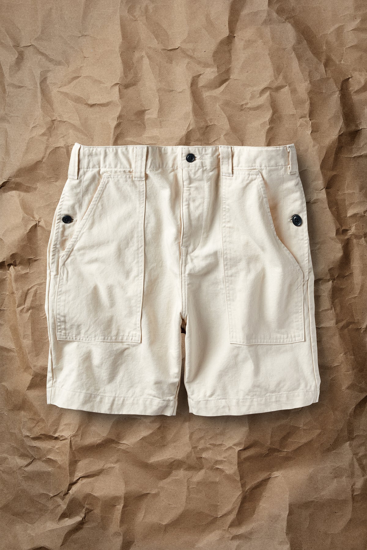 Natural cotton drill shorts with front fly, belt loops, two cargo pockets