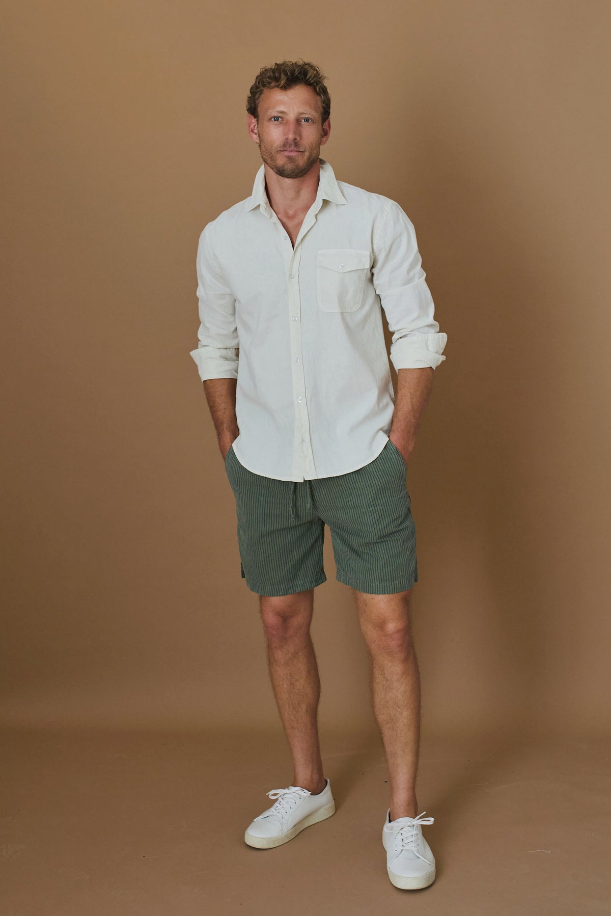 Men's off-white work shirt, long sleeves, button-up with point collar and chest pocket