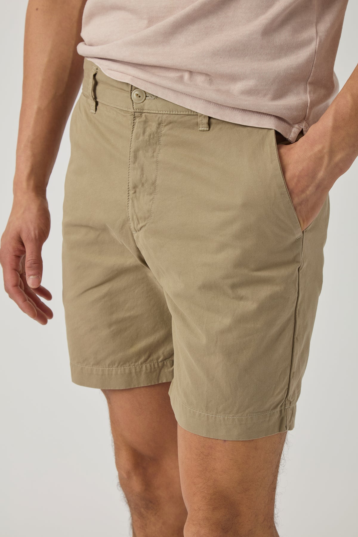 Khaki twill standard shorts close-up with button fly and pleated waistband