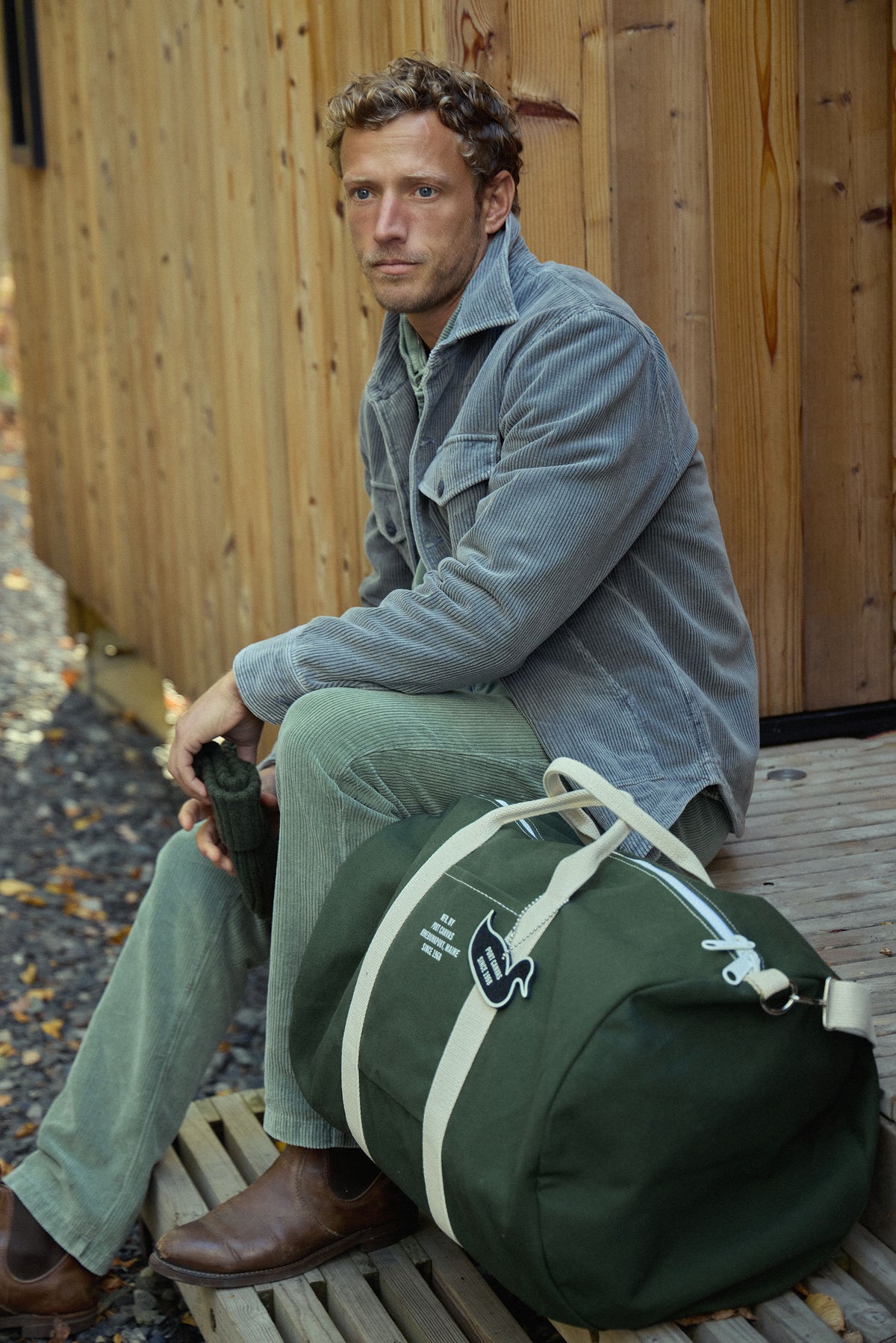 Wide wale corduroy trucker jacket in light slate blue with flap chest pockets