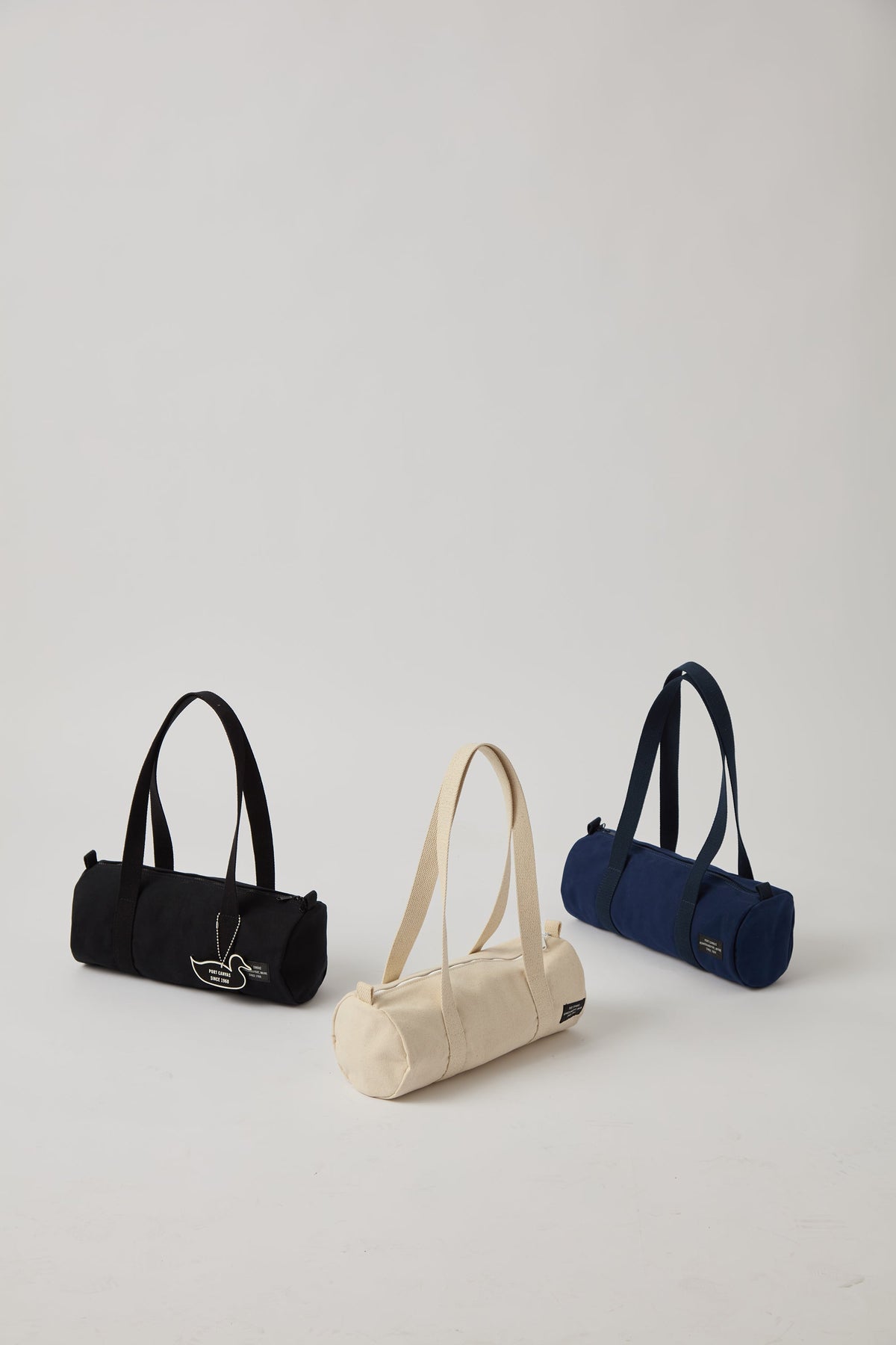 Duffy canvas tote duffle bag, three colors: black, natural, and navy