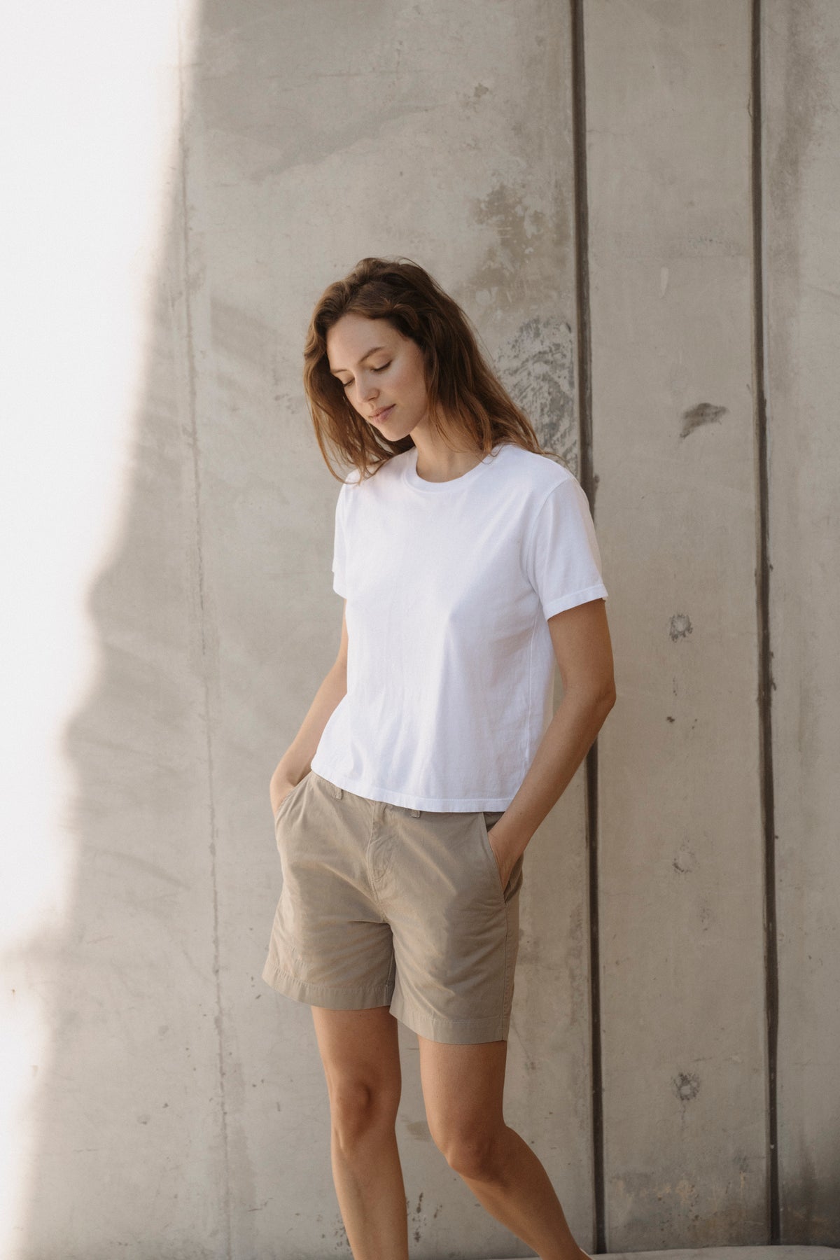 Light khaki twill shorts with front pockets and belt loops