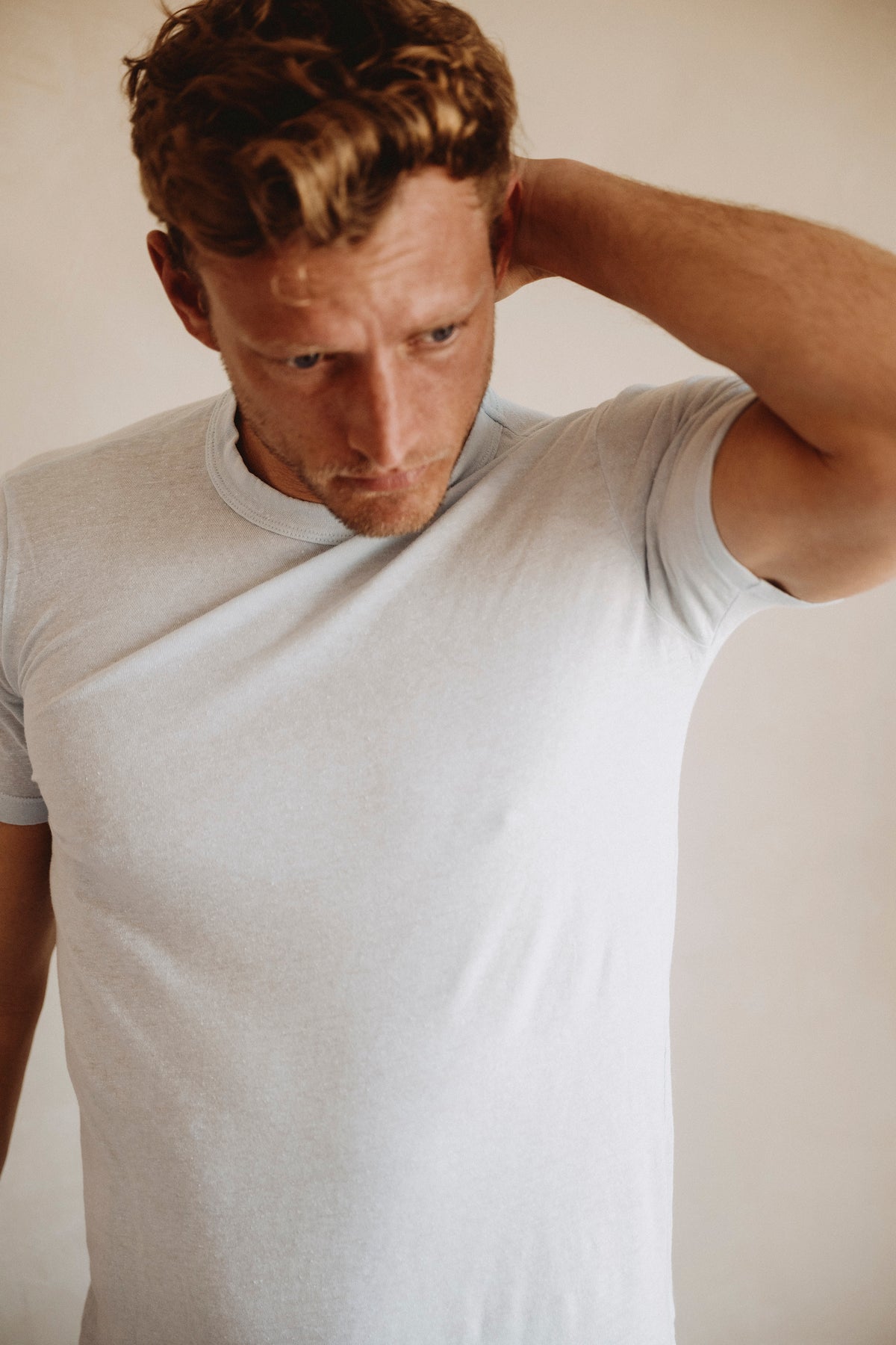 White lounge tee on model, short-sleeve crew neck