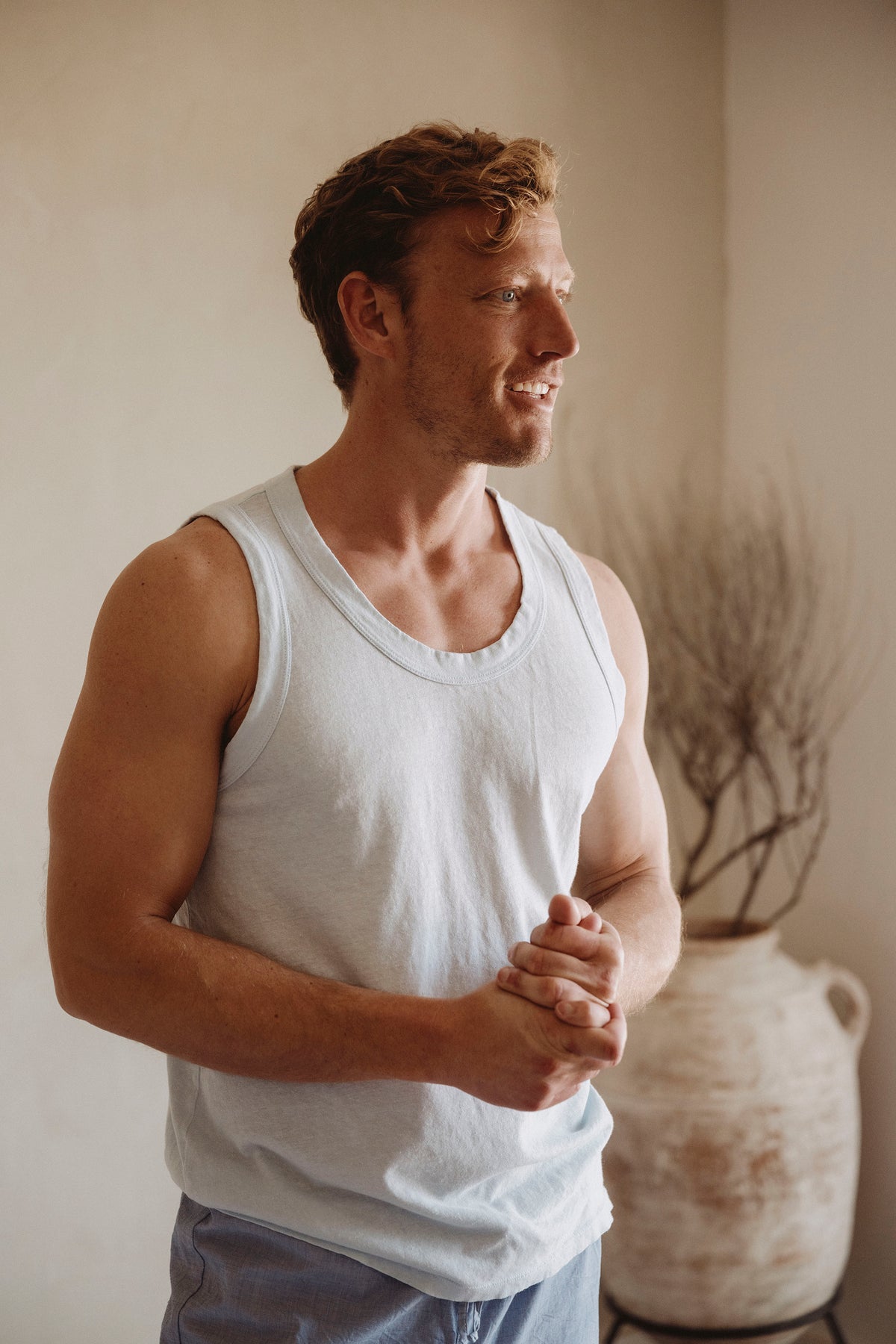 White cotton-hemp tank top on person, sleeveless crew neckline