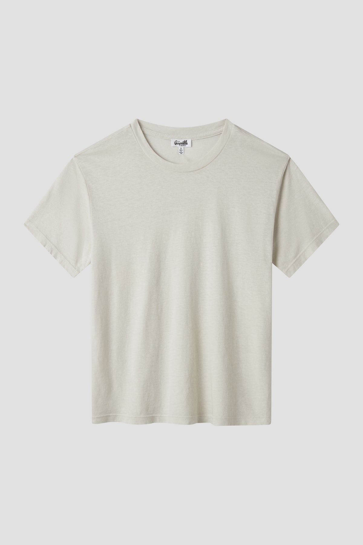 Cream crew neck short-sleeve T-shirt with smooth knit and short sleeve cuffs.