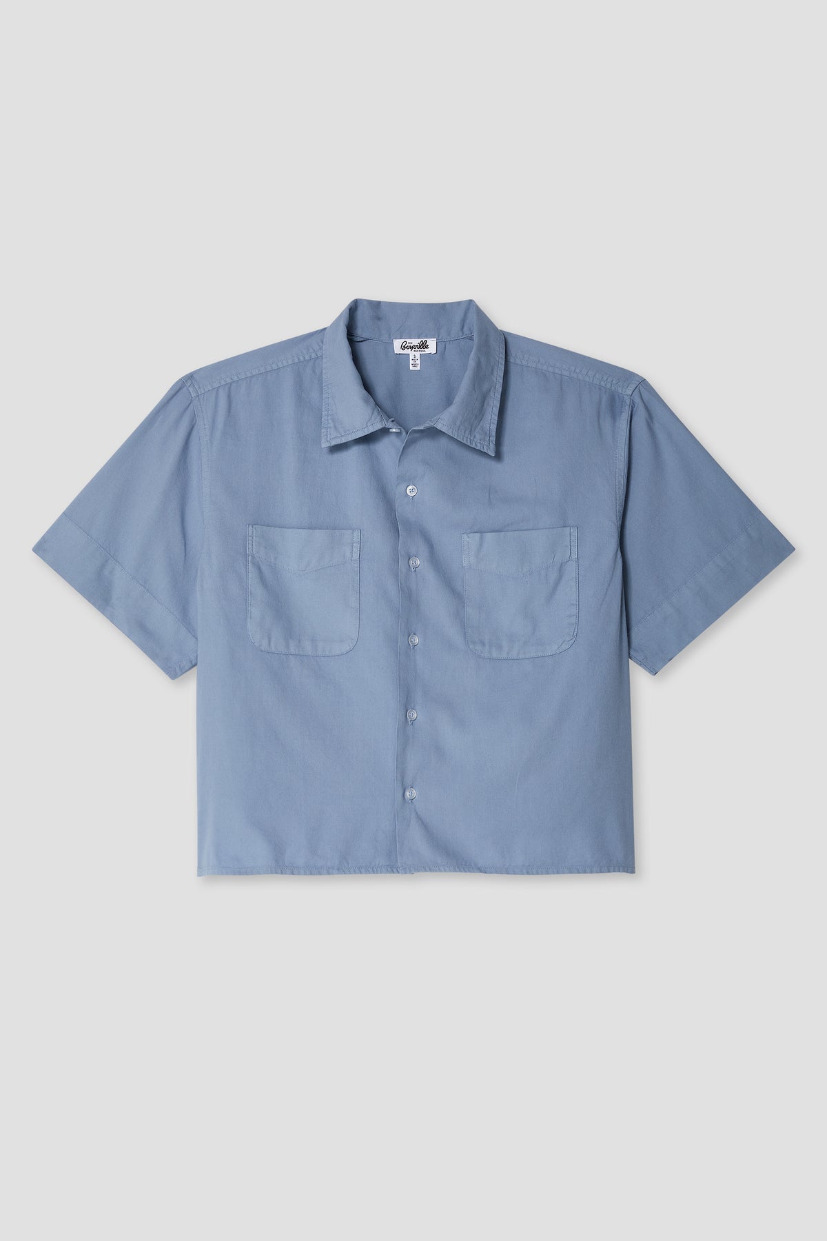Boxy oxford shirt in light blue, short-sleeve button-front with pointed collar