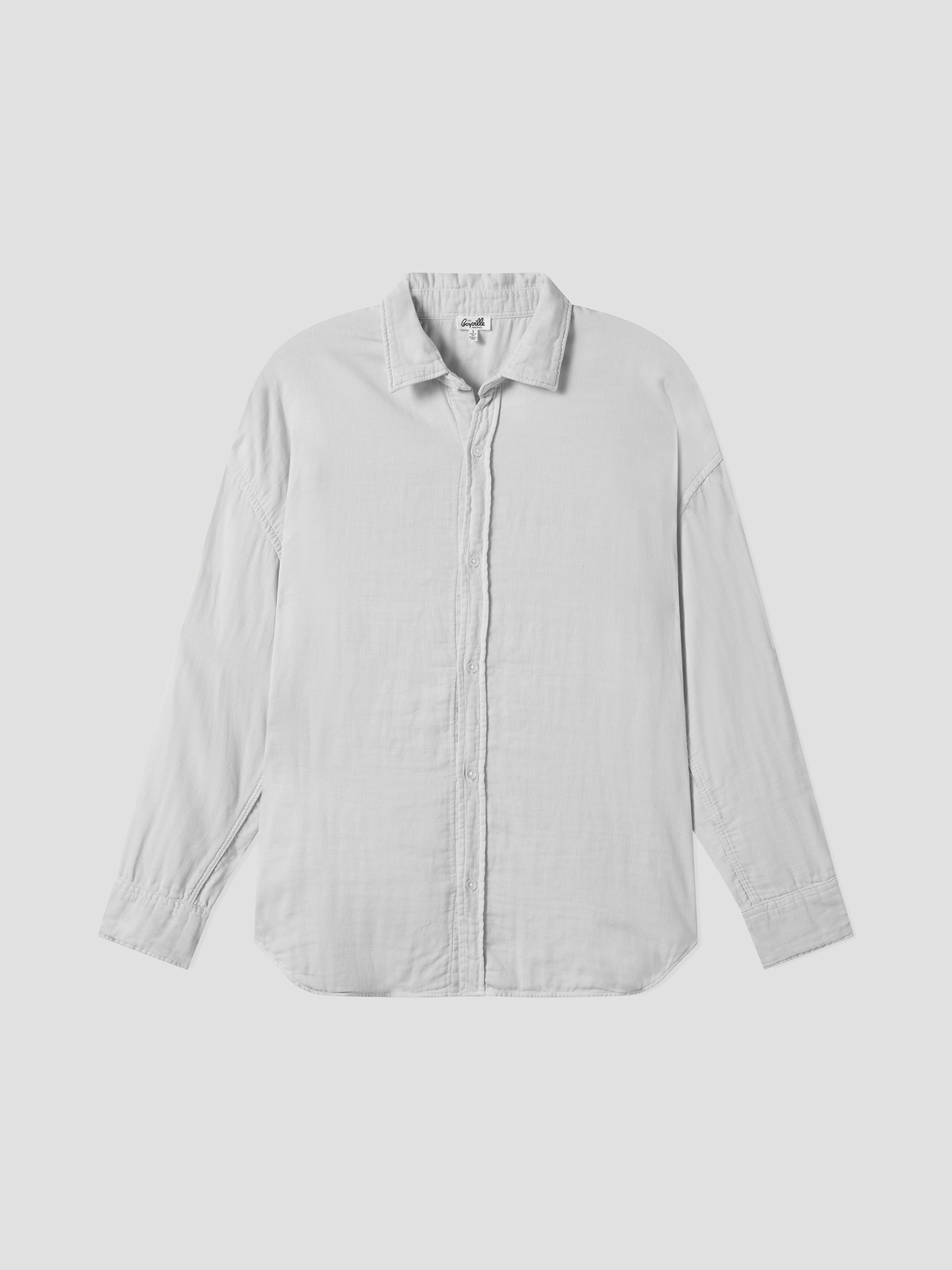 White triple gauze easy shirt with pointed collar, button front, and long sleeves.