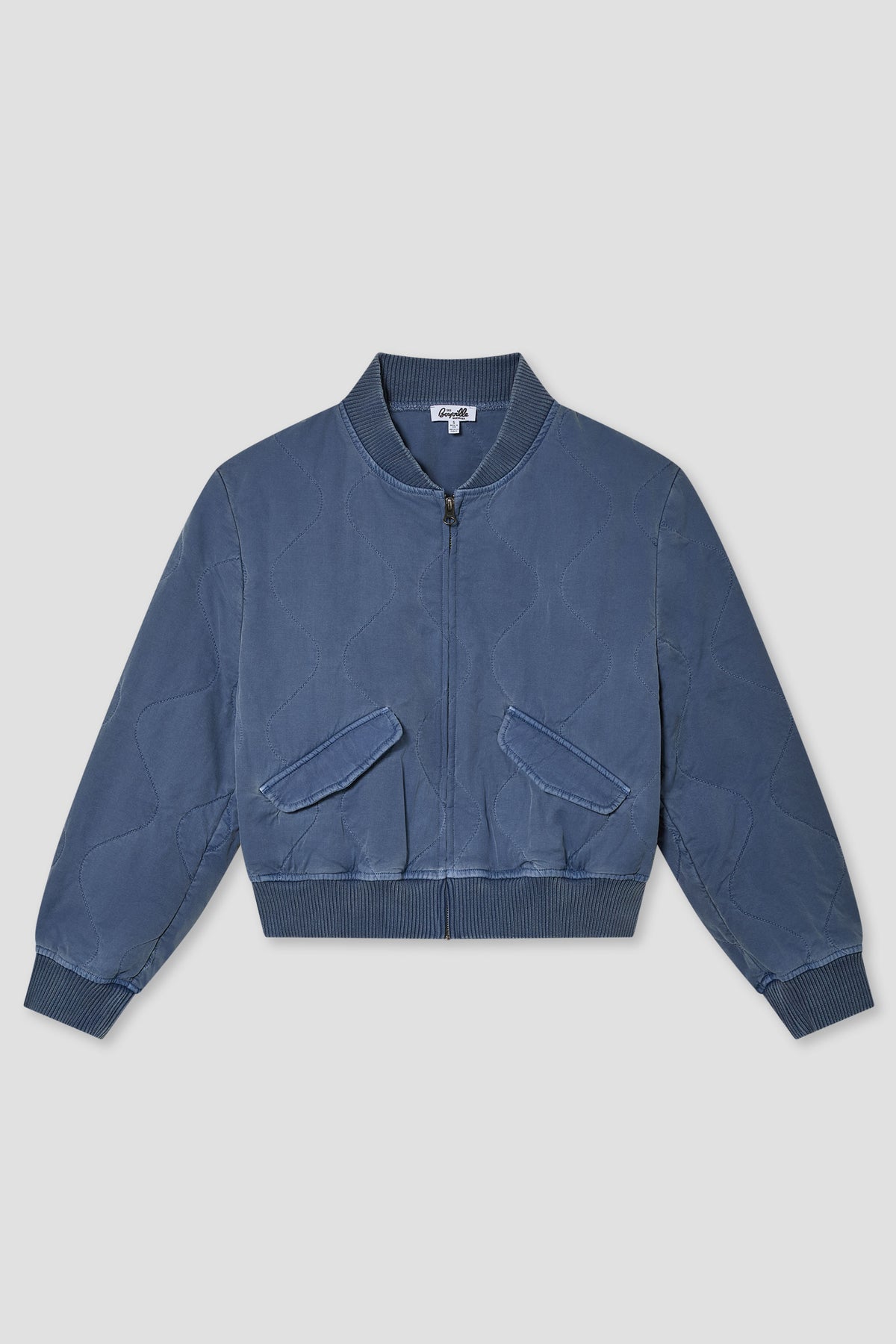 Navy blue zip bomber jacket with ribbed cuffs and flap pockets at the chest and waist