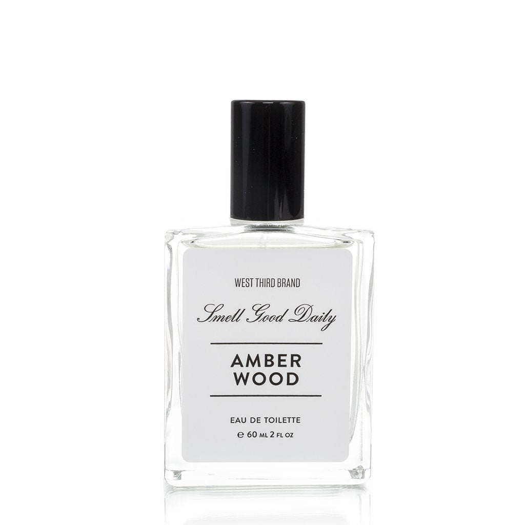 West Third Brand Eau de Toilette bottle with black cap, Amber Wood scent