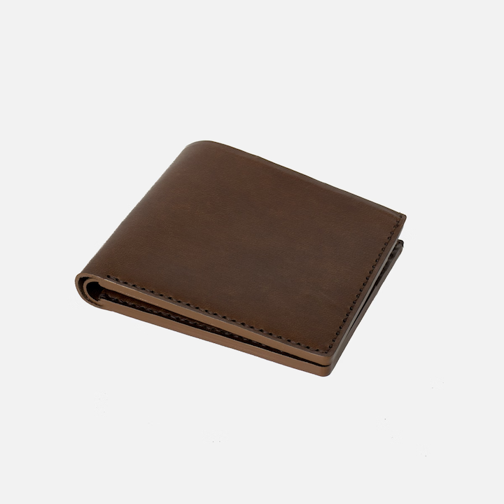 Open billfold wallet in dark brown leather with curved edge and stitching