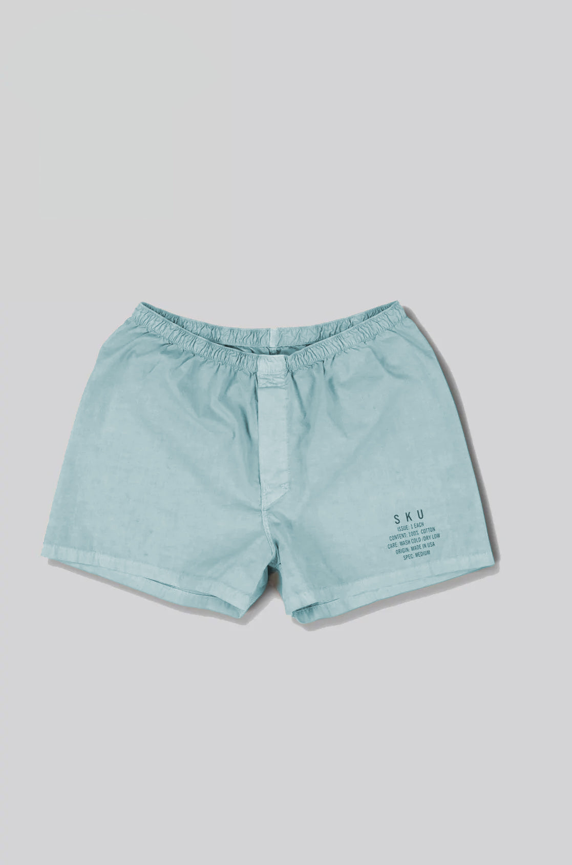 Washed dye field boxers in teal blue with elastic waistband and side pockets
