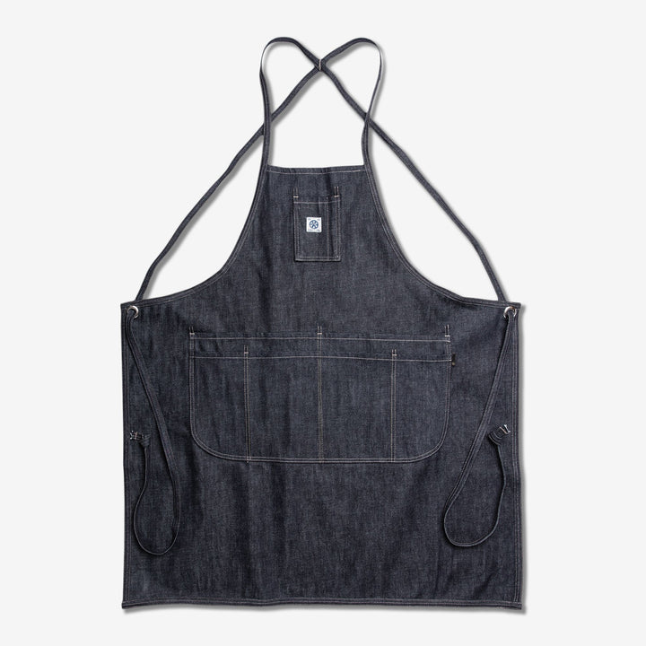 Raw denim apron with large front pocket and side tool pouches