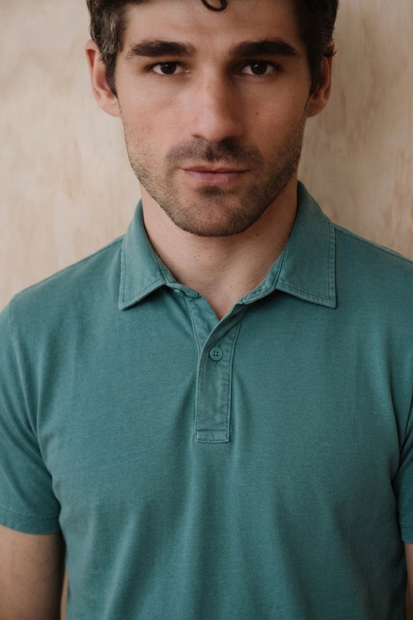 Teal short-sleeve Supima polo shirt with collar and partial button placket