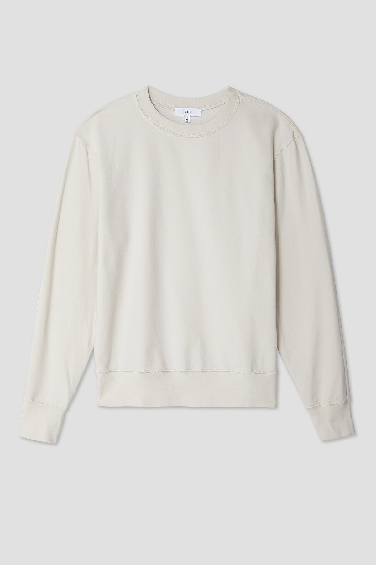 Light cream crewneck sweatshirt with ribbed hem and long sleeves